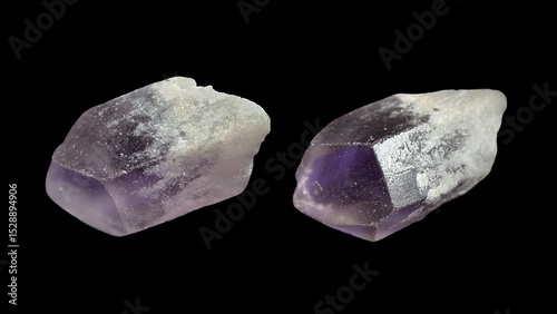 macro mineral amethyst crystal isolated on a black background