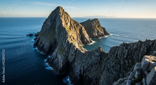 Dramatic coastal cliffs and ocean view at sunset