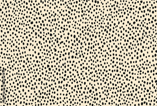 seamless pattern of small dots in light beige and black, arranged to create an abstract cheetah-like texture, perfect for creating animal print wallpaper or fabric designs
