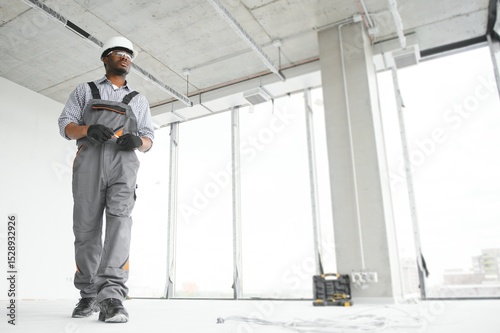 Wallpaper Mural Portrait of a worker in a construction site Torontodigital.ca