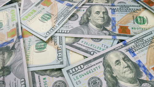 Detailed closeup shot of United States Currency Concentration on Hundred Dollar Bills