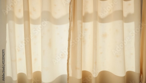 Sheer curtains softly filtering light in a bright indoor space  