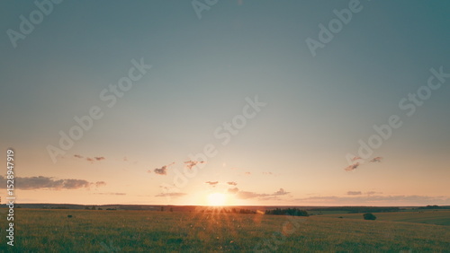 A Beautiful Golden Sunrise Over the Serene and Tranquil Landscape Awaits You Today