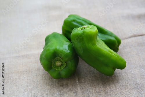 fresh summer vegetables on a linen tablecloth, green pepper
