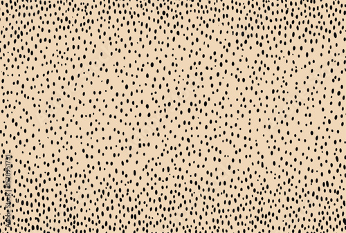 Abstract seamless pattern with tiny black dots on a beige background. Minimalist leopard print texture for design, fashion textiles, wallpaper, fabric, or packaging paper. Vector illustration.