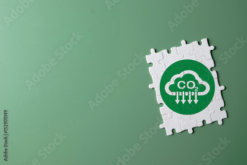 Concept for climate action,carbon emission reduction,net-zero,ESG,carbon footprint,Eco-friendl.,White puzzle with reduce co2 carbon icon on green background idea for business,industrial,enviromental.