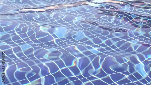 Clean water in a swimming pool with a blue bottom.
