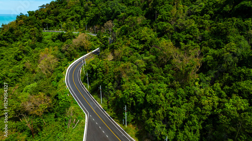 Aerial view of  landscape view from flying drone in Nature as coastline of road way scenic view