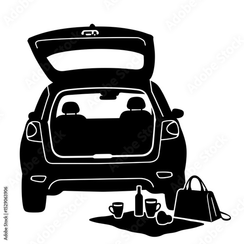 Silhouette of car with open trunk and picnic setup, leisure travel scene