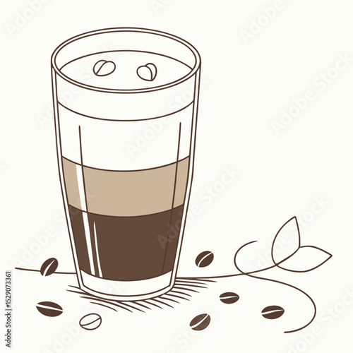Coffee drink in tall glass with layers and coffee beans scattered  