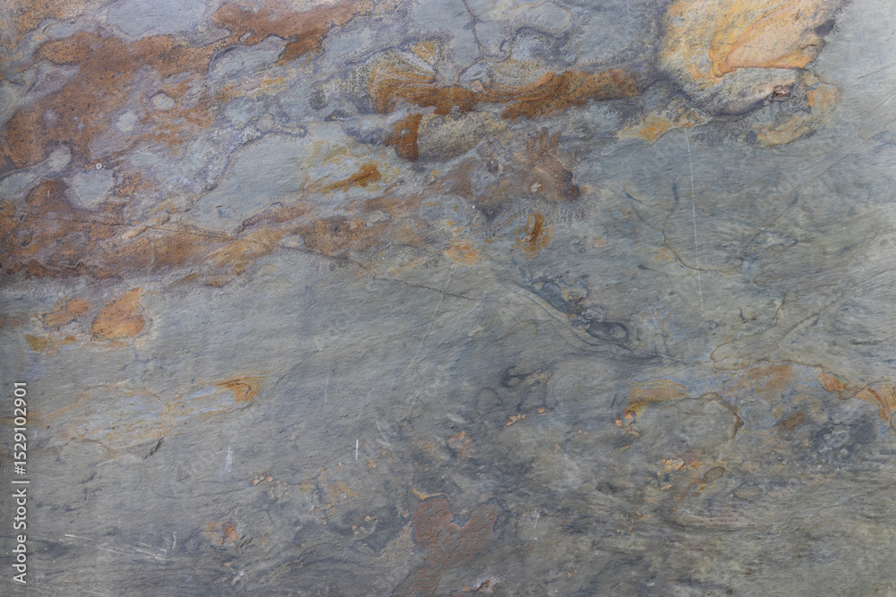 Fototapeta premium Abstract Stone Background, Weathered Rock Surface with Earthy Hues and Veining