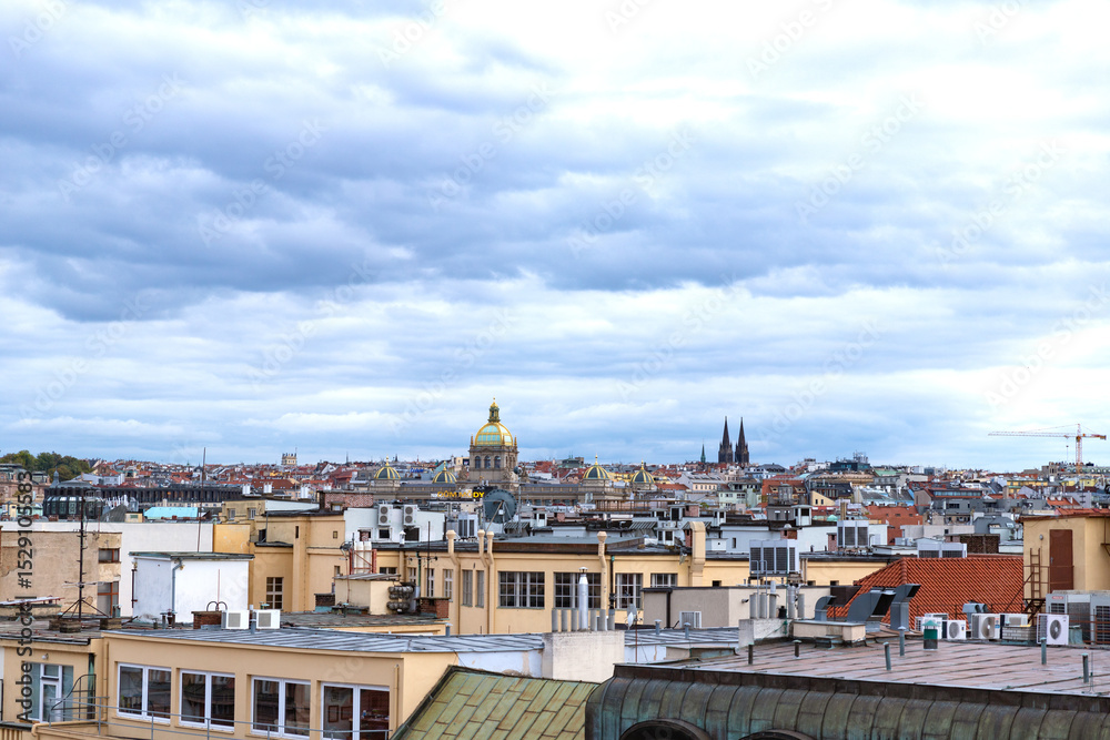Fototapeta premium The rooftops and architecture of the Prague city