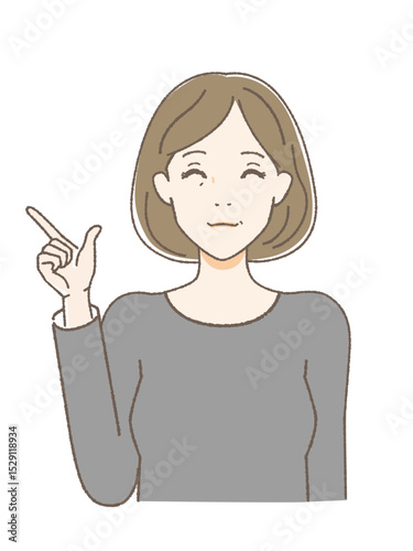 指をさして微笑む中高年女性　
