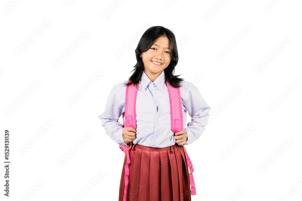 Happy Schoolgirl with Pink Backpack Smiling in Uniform on White Background Happy Schoolgirl with Pink Backpack Smiling in Uniform on White Background