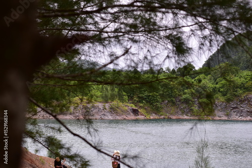 Tham Thong Lang is beautiful and famous tourist attraction in Phang Nga Province, Quarry view point overlooking a large green pond Tham Thong Lang Stone Quarry is located at Ban Nai Wang photo