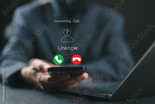 Fraud and Phishing Concept with Unknown Caller Alert. Woman displaying an incoming call from an unknown number, symbolizing fraud, phishing, and spam call warnings. Scammer or stranger, Prank caller