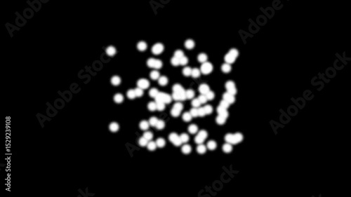 White blur dots are scattered on a dark background 
are scattered on a dark background. Bokeh effect on black background.