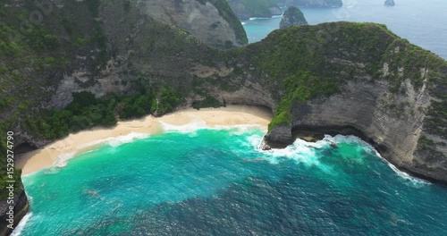 Bali Paradise beach aerial drone view Kelingking cliff Nusa Penida sandy coast