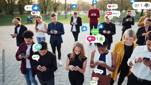 People standing in a park, using smartphones and receiving social media notifications, reflecting the influence of technology on communication and social interaction