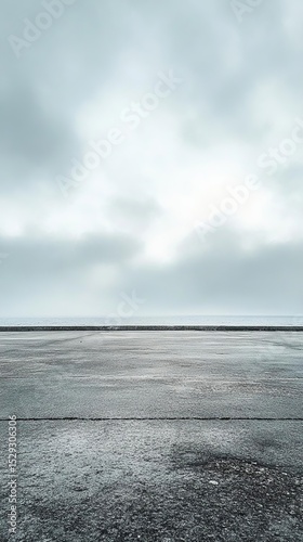 Scenic Foggy Coastal Road Beside Lake or Sea — Ideal for Car Display