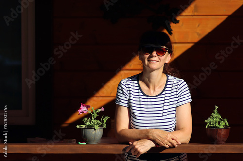 portrait of a woman sitting on the grass