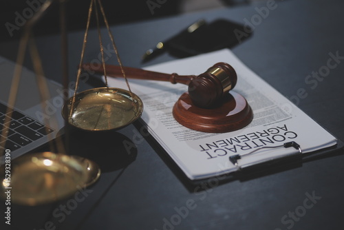 female business woman lawyers working at the law firms. Judge gavel with scales of justice. Legal law, lawyer, documents, advice and justice concept.