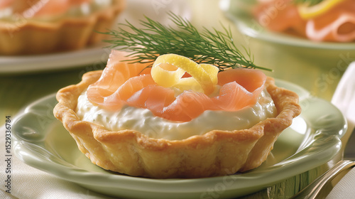 Smoked Salmon and Cottage Cheese Tart with Dill and Lemon on Pastel Plates photo