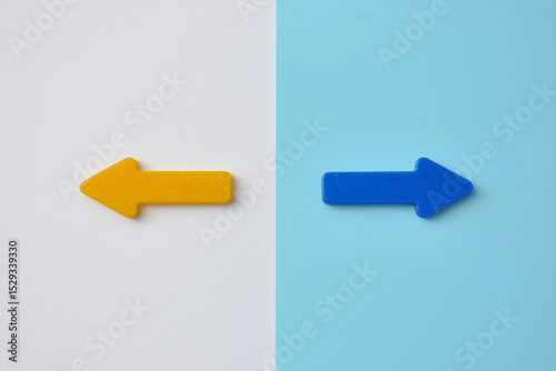 The two arrows point in different directions. It is a symbol of different approaches to life. Different paths