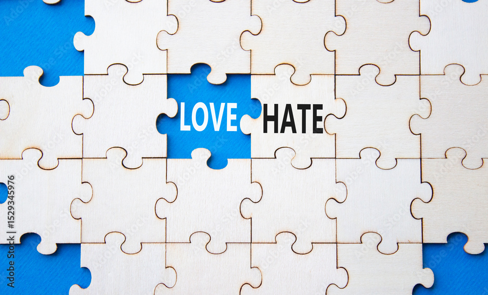 Fototapeta premium Love vs Hate symbol. Concept word Love vs Hate on wooden puzzle. Beautiful blue background. Business and Love vs Hate concept. Copy space