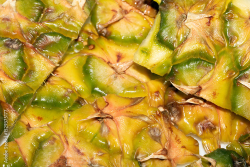 Close up of pieapple fruit skin on white background
