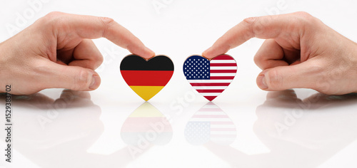 The concept of friendship and diplomatic relations between Germany and USA. The flag of Germany and US as a symbol of cooperation and respect.