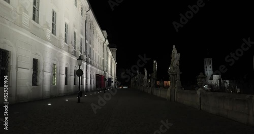 Night walk promenade old historic buildings in Kutna Hora, Czechia
