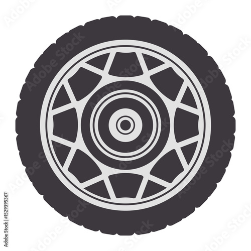 Close up view of a wheel with tire, showcasing the hubcap and intricate tread pattern, ideal for automotive and transportation related projects