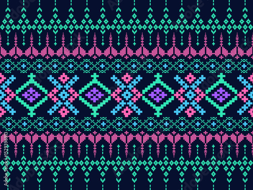 This vibrant native fabric print features intricate and orderly geometric patterns reminiscent of cross-stitch embroidery. It harmoniously blends pink, blue, and mint green on a dark blue background, 