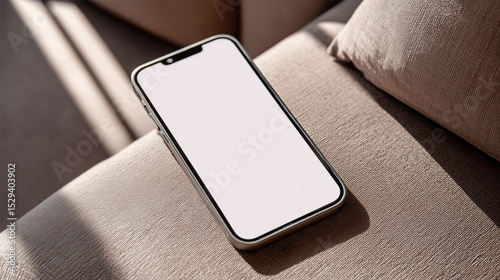 Smartphone on Beige Couch Surface in Bright Natural Light
