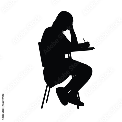 Silhouette of a female student writing on a writing chair