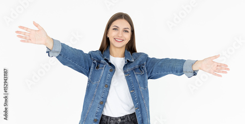 Portrait of a happy young girl with outstretched hands to embrace you isolated on a white background. Woman wants to hug you.