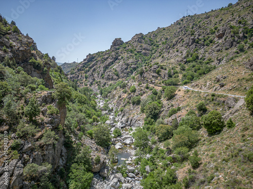 Camping Caravan driving through Canyon de la Ruda road Corsica down the pass monte Cino