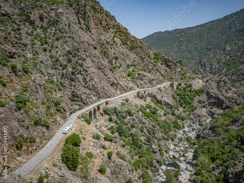 Camping Caravan driving through Canyon de la Ruda road Corsica down the pass monte Cino
