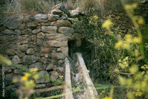 Es Broll Ibiza Es Broll is an artesian well that uses the water that emerges from the spring to distribute it throughout the valley through a complex system of irrigation ditches.