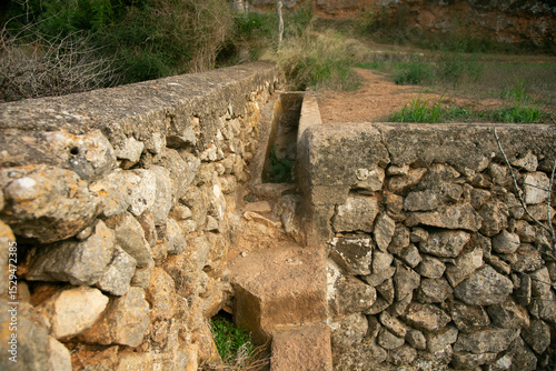 Es Broll Ibiza Es Broll is an artesian well that uses the water that emerges from the spring to distribute it throughout the valley through a complex system of irrigation ditches.