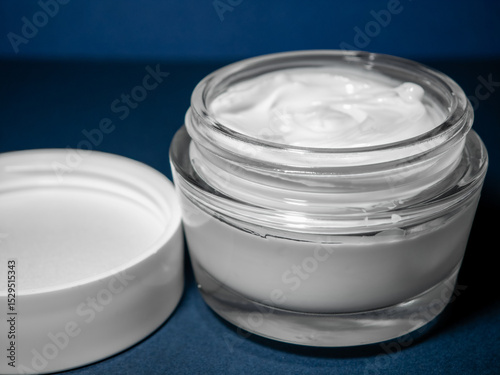 isolated anti-aging moisturizing face cream in a jar, close-up care cosmetic photo