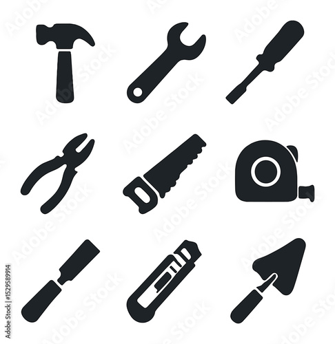 Construction Tools Icons. Solid, filled icons set of construction hand tools: hammer, wrench, screwdriver,