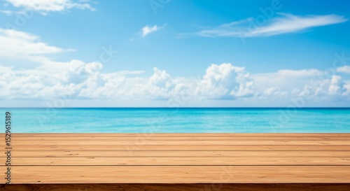 Wooden Table on Tropical Beach with Azure Sea and Cloudy Blue Sky