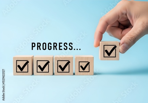 Achieving Progress Milestones Checkmarks on Wooden Blocks Business Concept