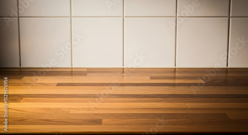Wooden kitchen countertop with glossy finish and white subway tile backsplash in warm natural light, ideal blank background for food photography, mockups, or cooking content