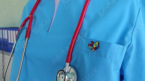World Autism Awareness and Pride Day with ribbon with puzzle pattern. Autism causes symptoms of disease