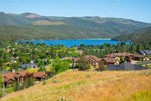 Liberty Lake, a small suburban lake in a suburb of the Spokane Washington area seen from a luxury hillside community of view homes.