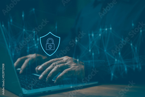 the Information Technology and Cyber ​​Security Concept. Man Using Computer to Protect Personal Data on Laptop Computer and Internet Technology Network Online.