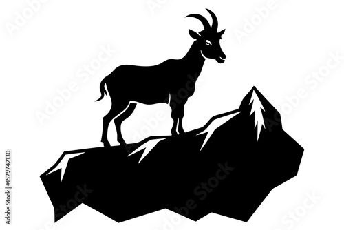 Silhouette of a mountain goat on a peak